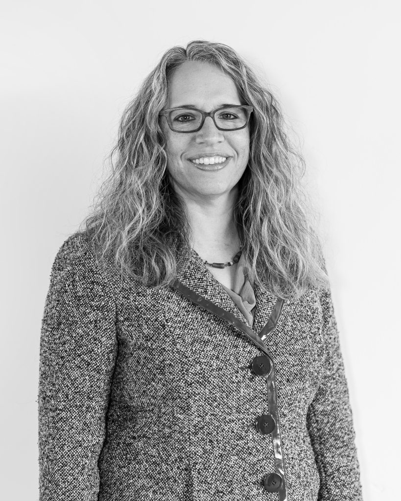 A black and white portrait photograph of Mandy Birch.