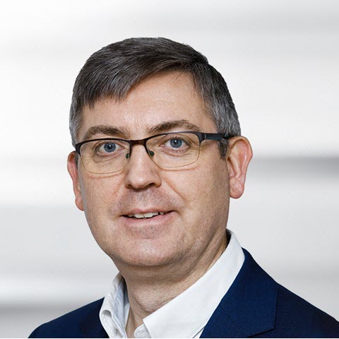 A headshot of Robert Curran.