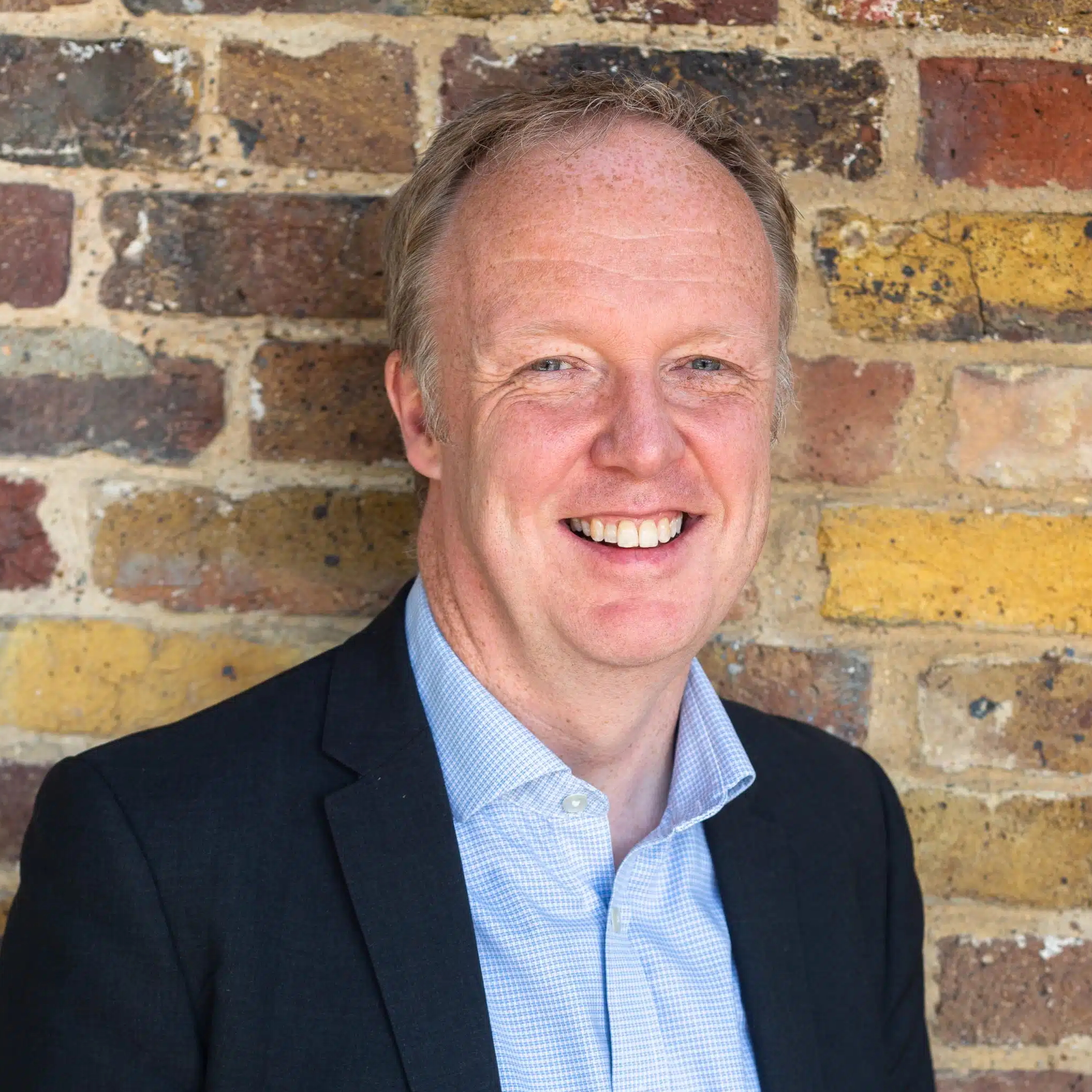 A headshot of Dr Joe Marshall.