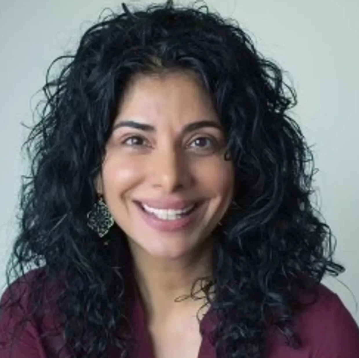 A headshot of Zenia Tata.