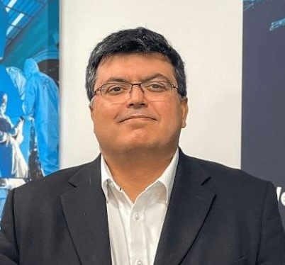 A headshot of Nick Singh.