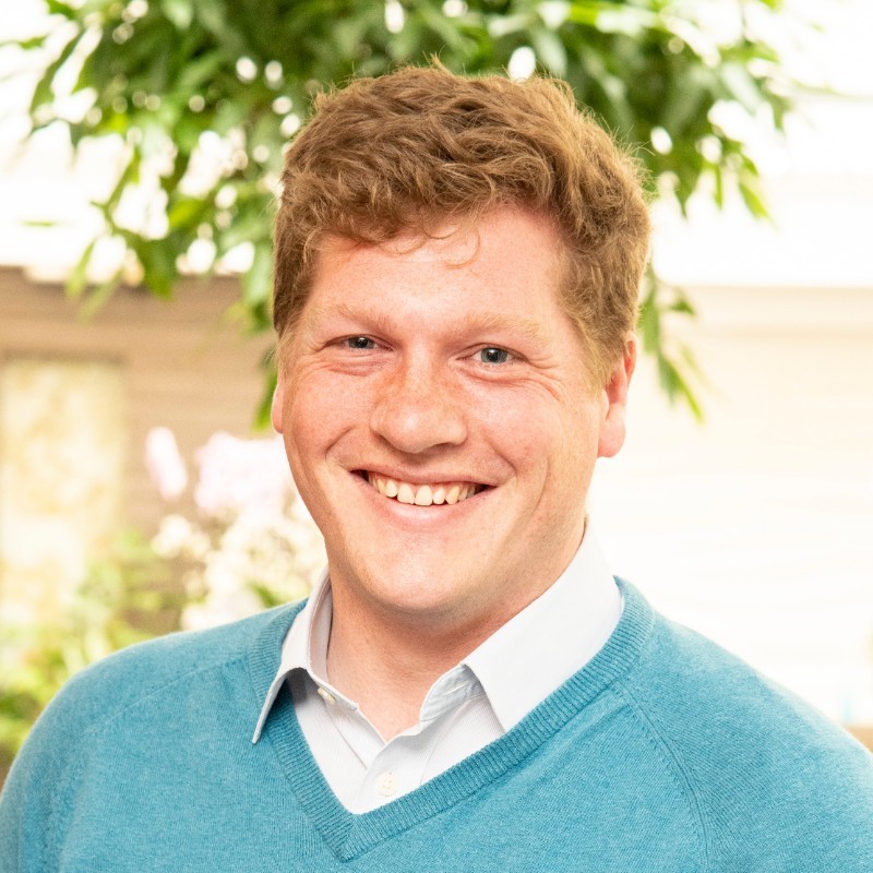 A headshot of George Mills, director of investments at the British Business Bank.