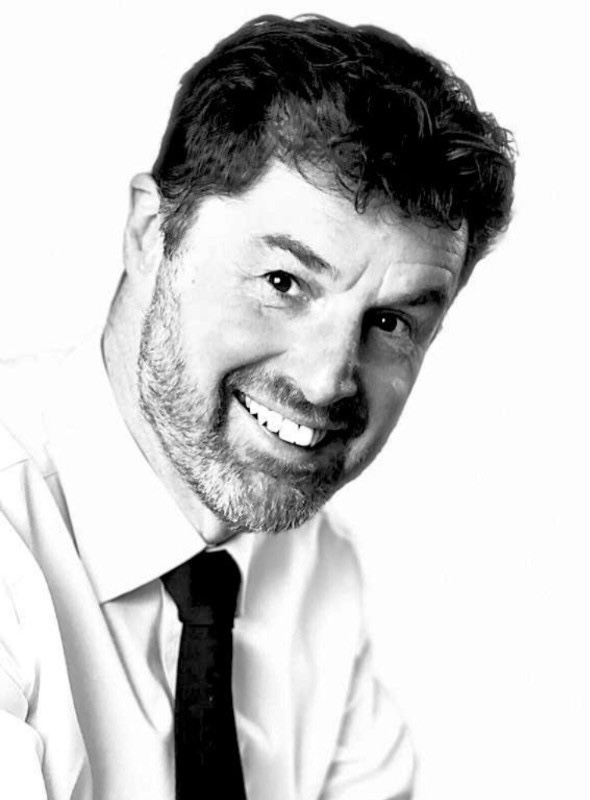 A black and white headshot of Peter Marshall, an industry specialist with Federated Telecoms Hubs.