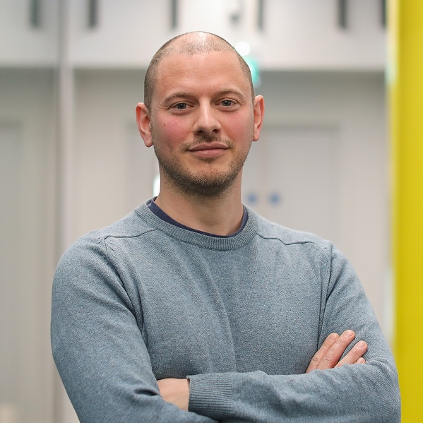 A headshot of Ashley Brewer.