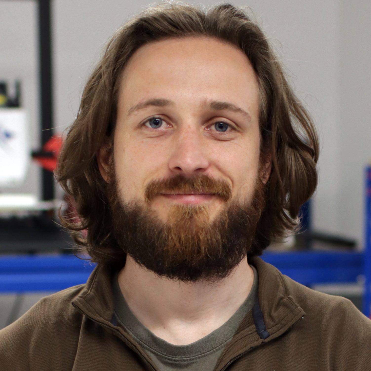 A headshot of Kevin Driscoll-Lind.
