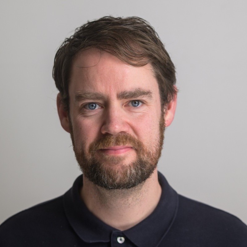A headshot of Lawrence Lundy-Bryan.
