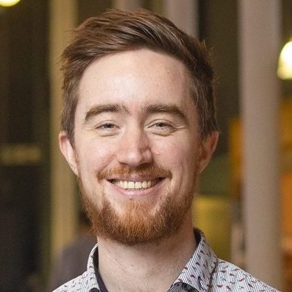 A headshot of Marty Reid.