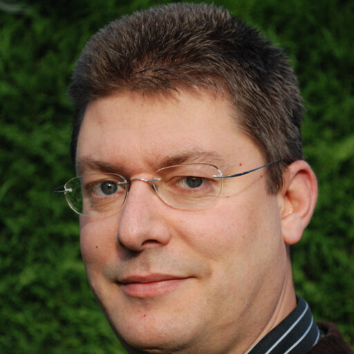 A headshot of Simon Fletcher.